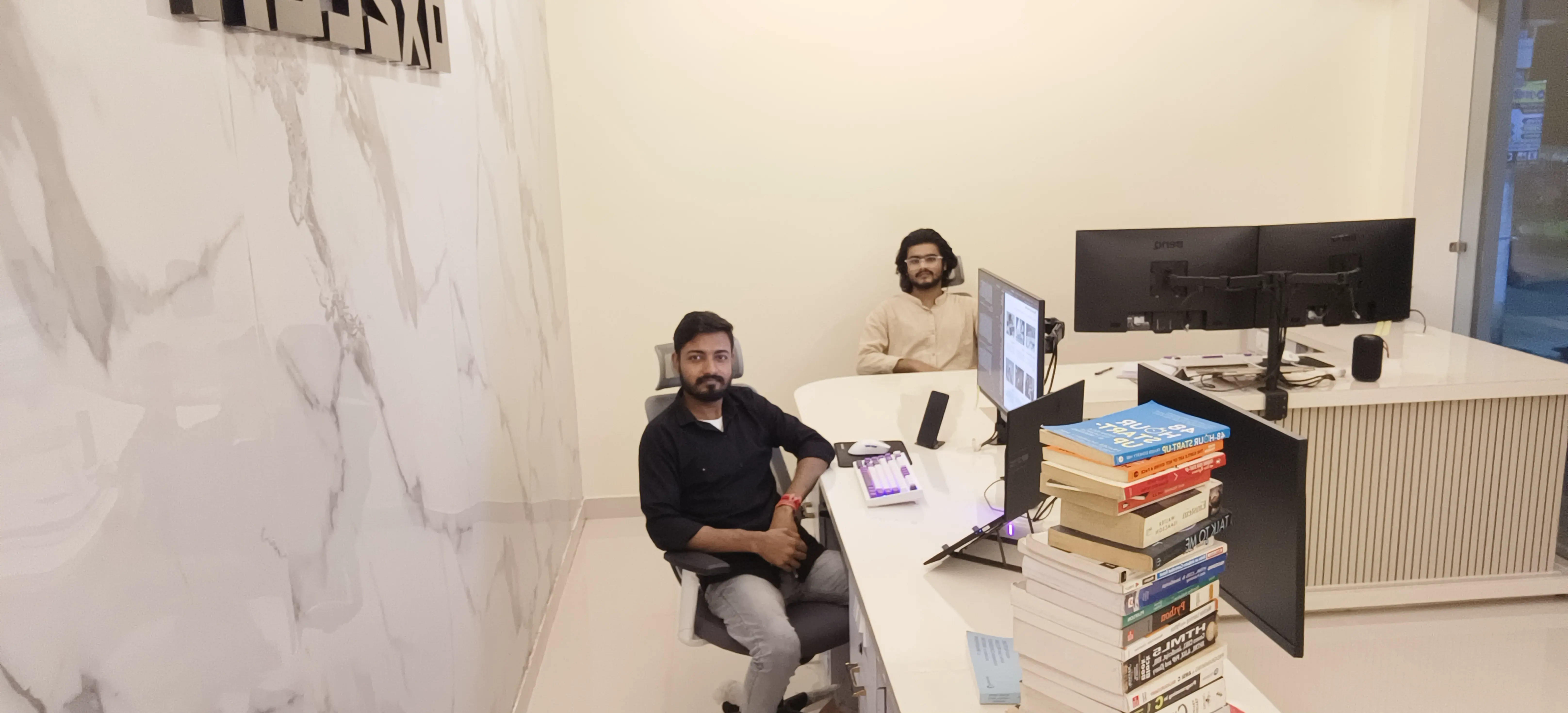 The Oxzeen team collaborating, representing their mission-driven approach to building brands.